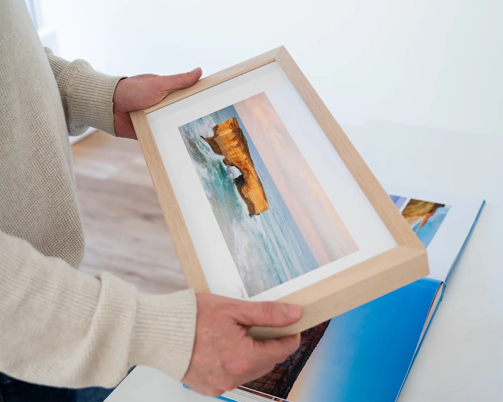 Framed artwork of London Bridge, a natural rock formation, on the Great Ocean Road with ocean and sky.