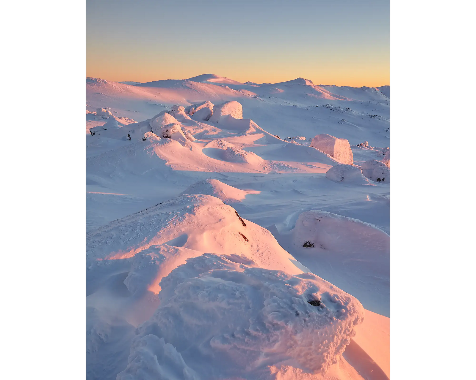 Tones Of Kosciuszko. Winter snow sunrise over Mount Kosciuszko.