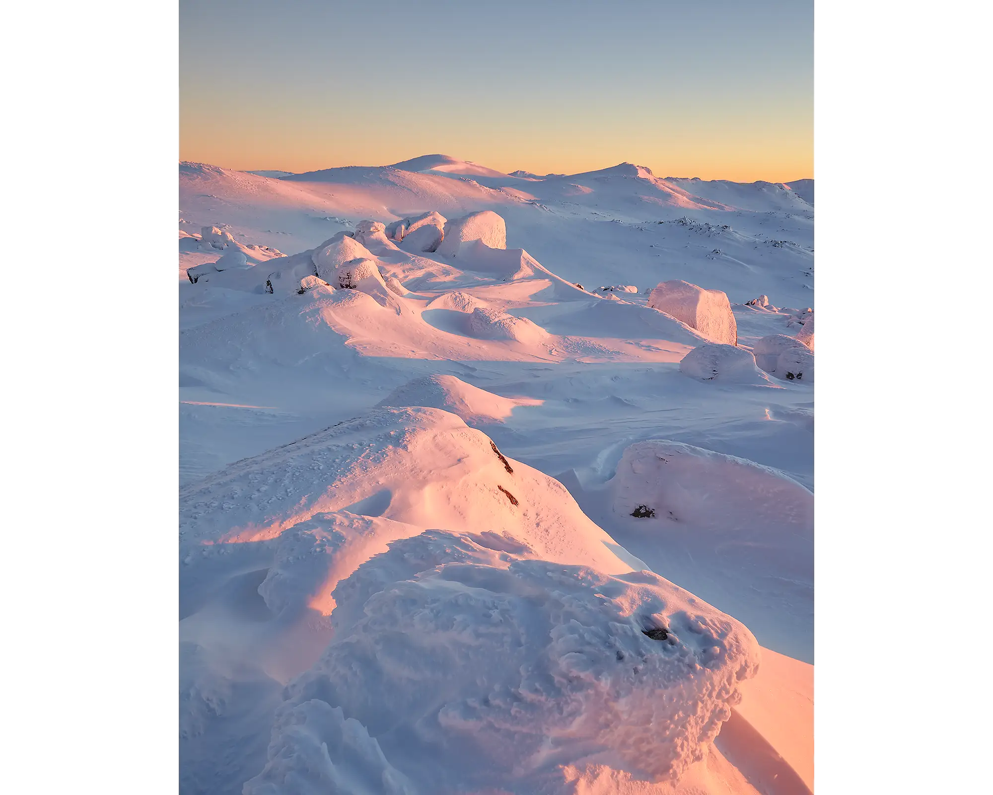 Tones Of Kosciuszko. Winter snow sunrise over Mount Kosciuszko.