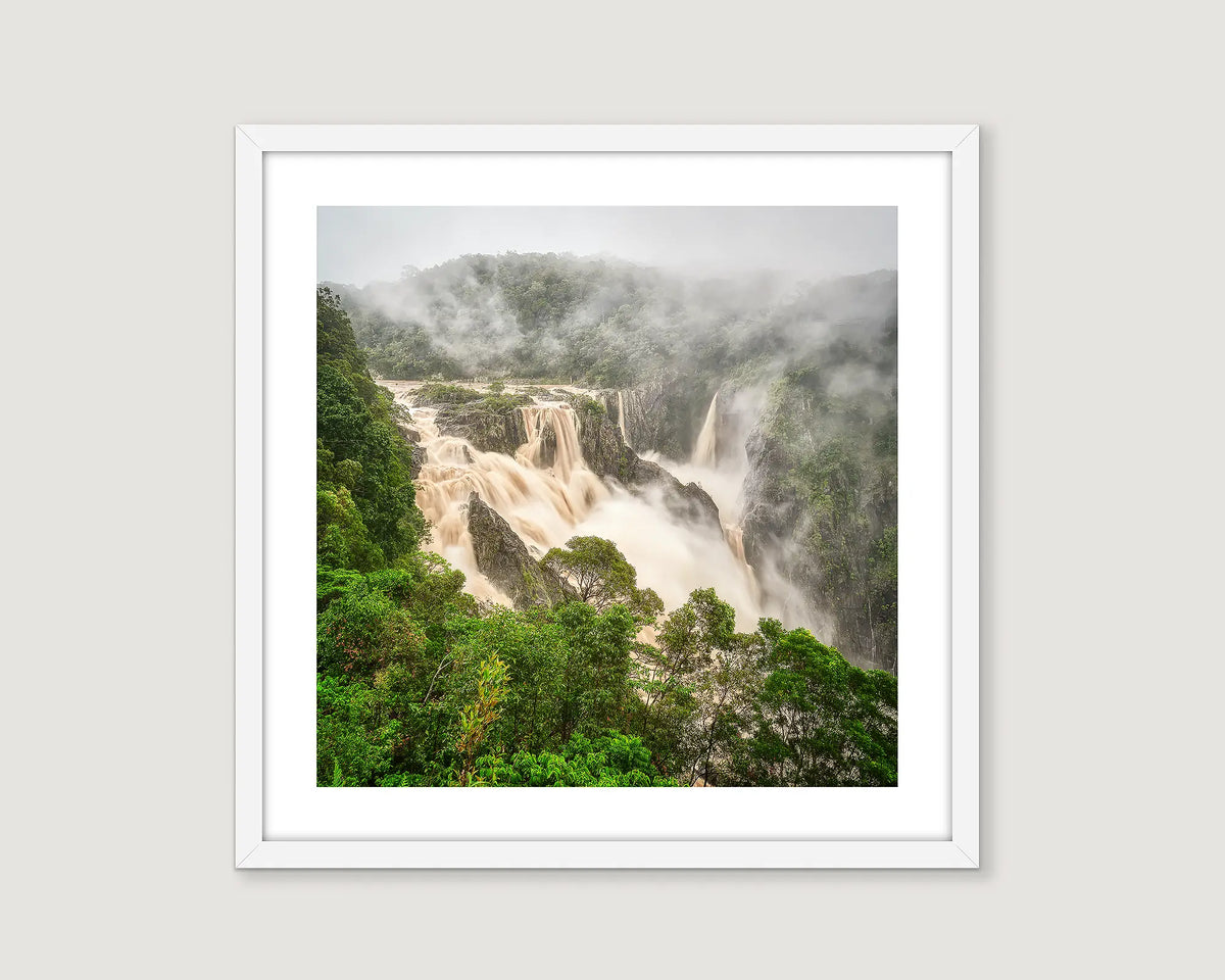Framed photograph of Barron Falls waterfall in a lush green forest on a grey background