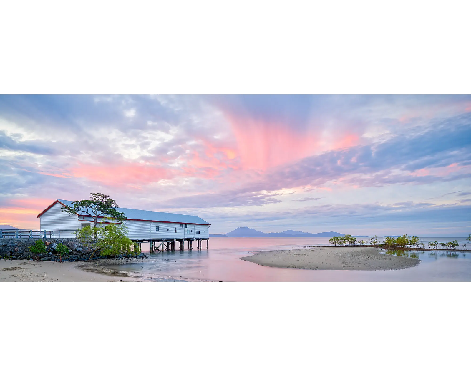 Twilight Blush. Sugar Wharf, Port Douglas, Queensland, with a stunning pink sunset.