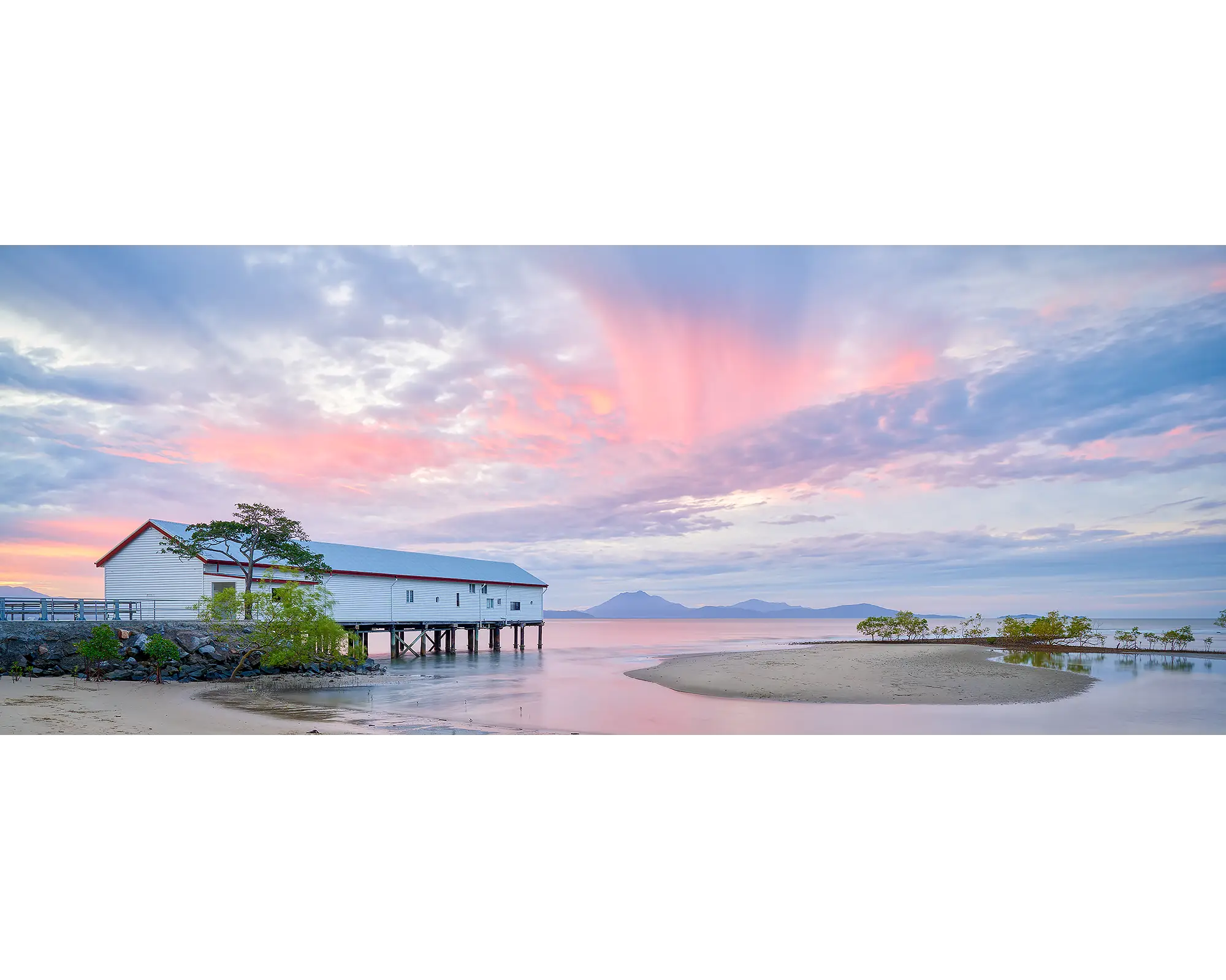 Twilight Blush. Sugar Wharf, Port Douglas, Queensland, with a stunning pink sunset.