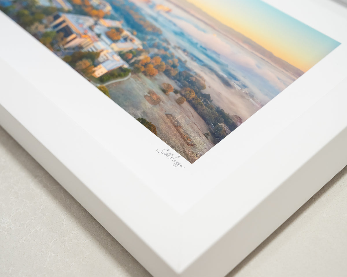 UC Revealed. University of Canverra small print with white frame, corner details.