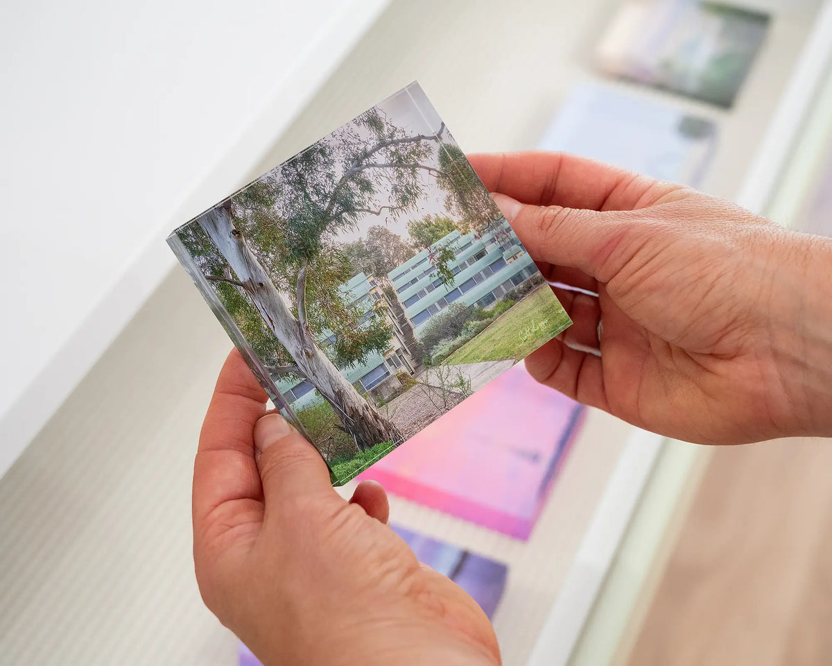 University Of Canberra 6. Acrylic block held in hands.