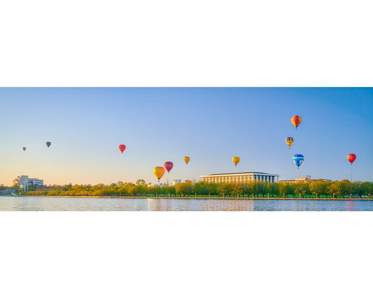 Upwards. Balloons over National Library during Balloon Spectacular, Vivid Festival, Canberra.