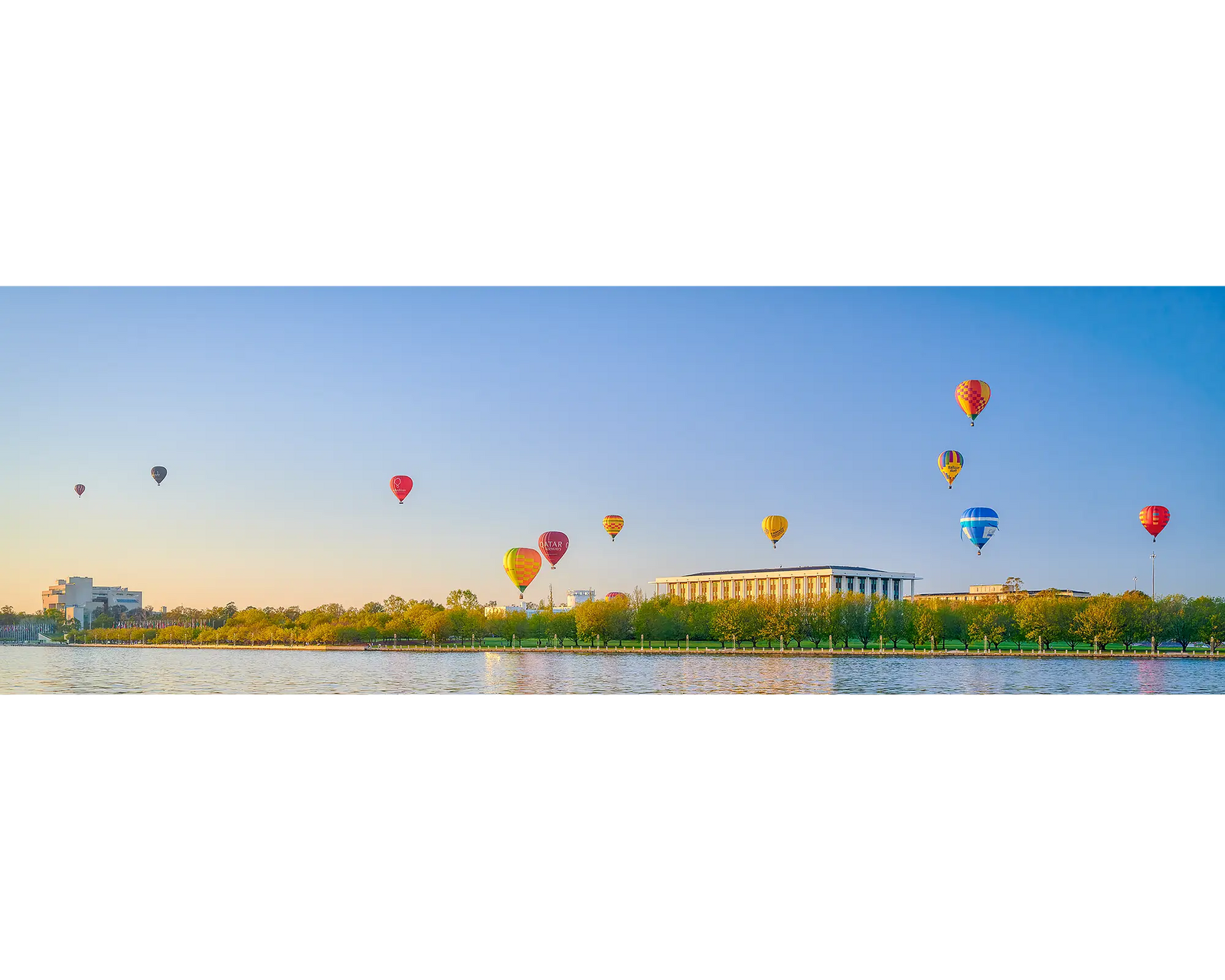 Upwards. Balloons over National Library during Balloon Spectacular, Vivid Festival, Canberra.