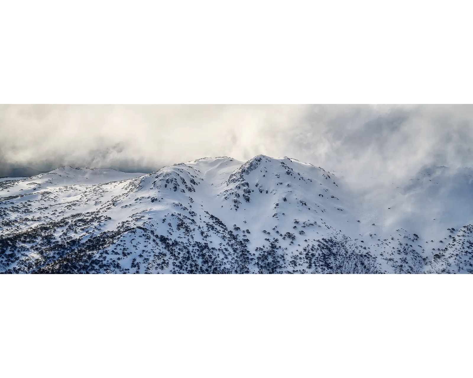 Veil OF The Alps. Twin Humps with snow and fog in Kosciuszko National Park.