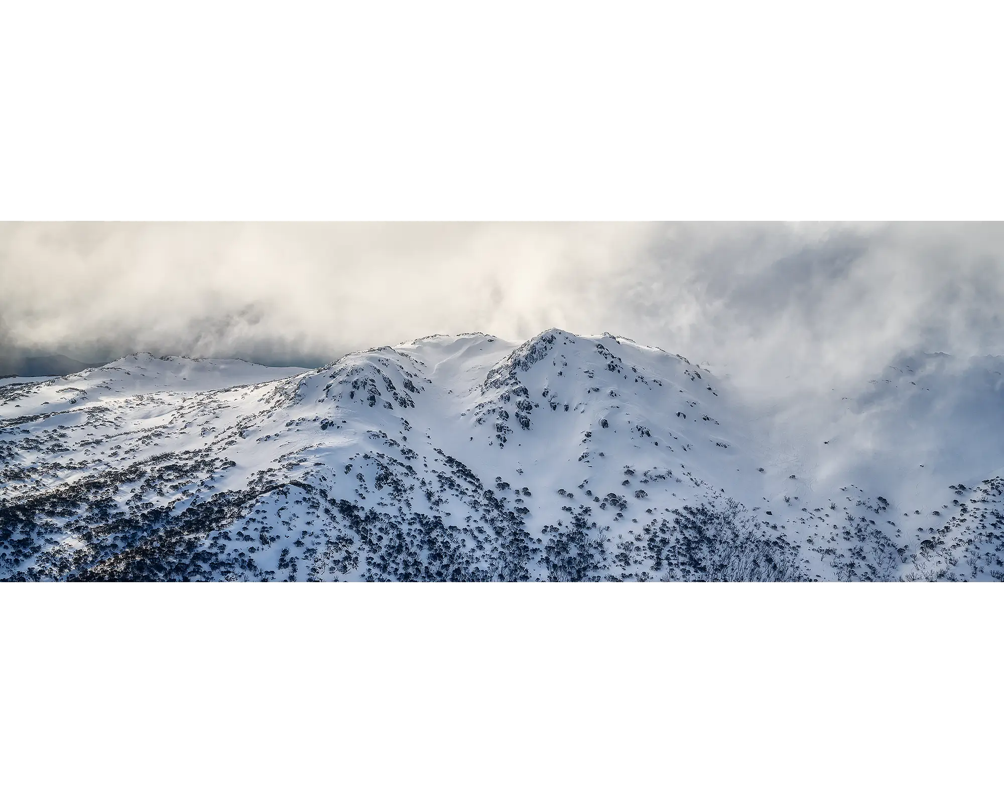 Veil OF The Alps. Twin Humps with snow and fog in Kosciuszko National Park.