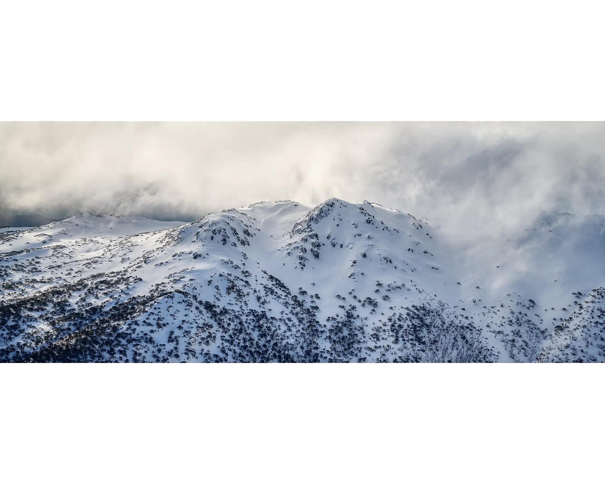 Veil of the Alps. Twin humps with snow and fog, Kosciuszko National Park. 