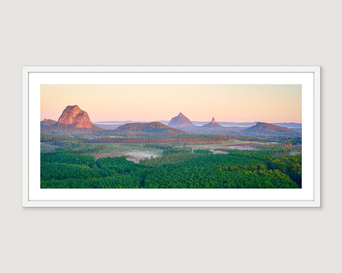 Framed landscape print of the Glasshouse Mountains landscape with greenery.