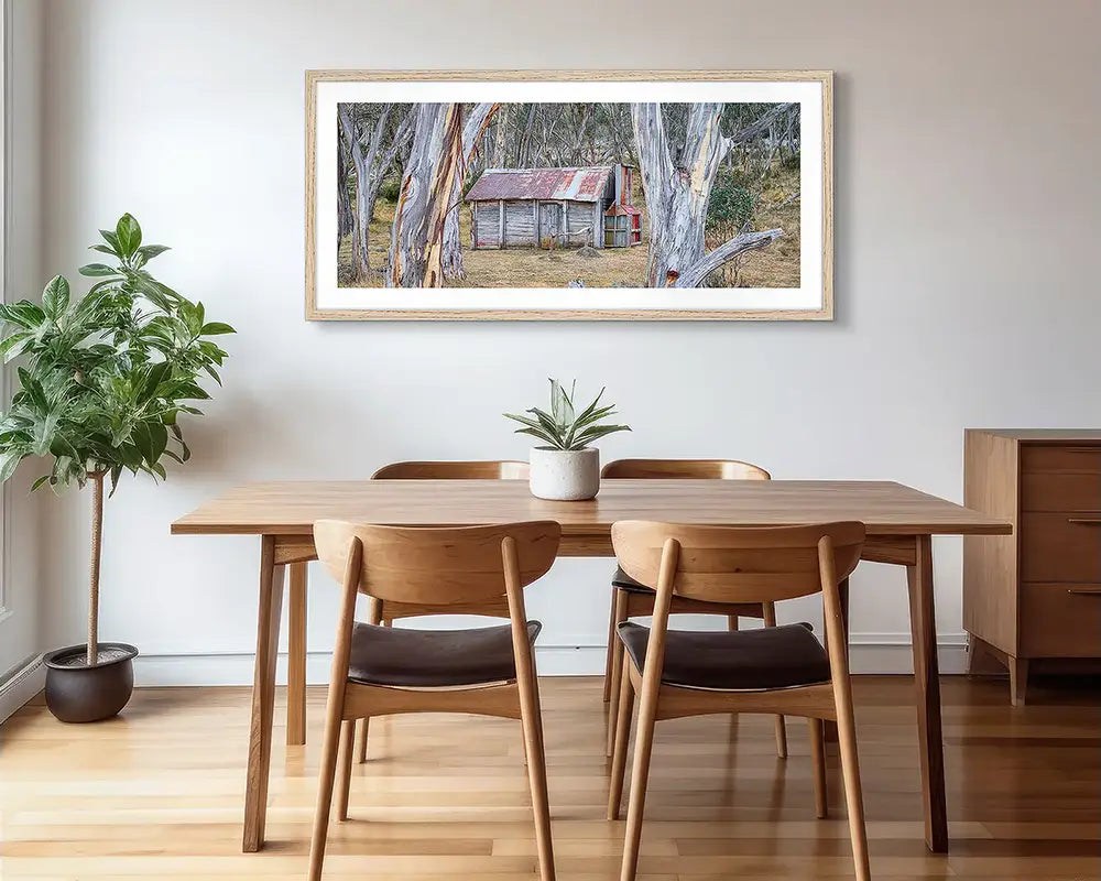 Wall art print hung in well lit kitchen.