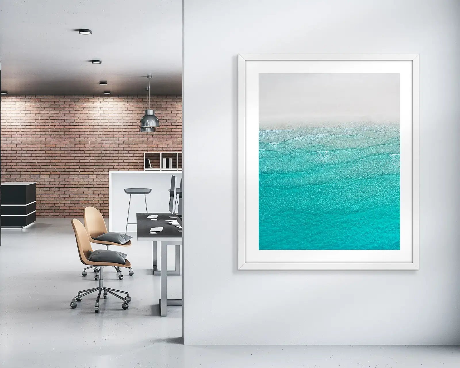 Wall art print with clam blue green tones hung outside office.