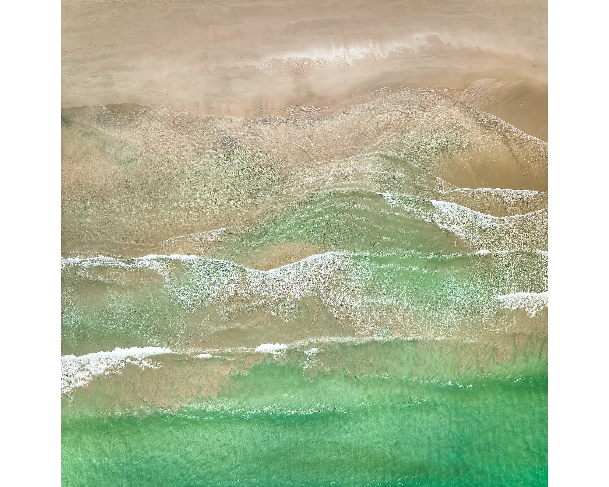 Waveforms - aerial view of North Broulee Beach. New South Wales, Australia.