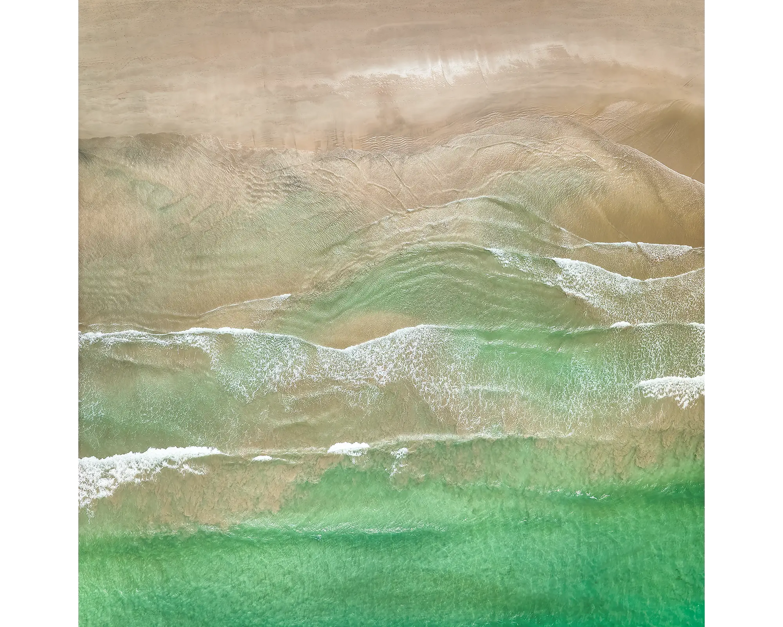 Waveforms. Aerial view of North Broulee Beach, South Coast, New South Wales.