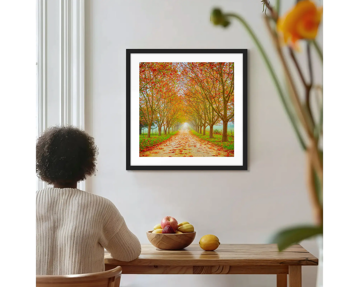 Welcome to Autumn. Photographic wall art print with a black frame, hung on a kitchen wall with a woman admiring. 