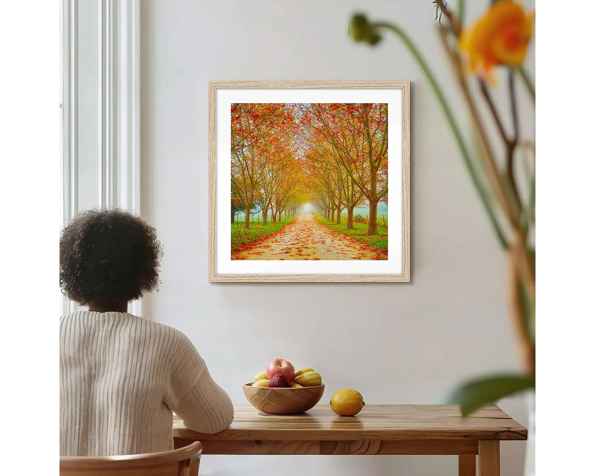 Welcome to Autumn. Photographic wall art print with a timber frame, hung on a kitchen wall with a woman admiring. 