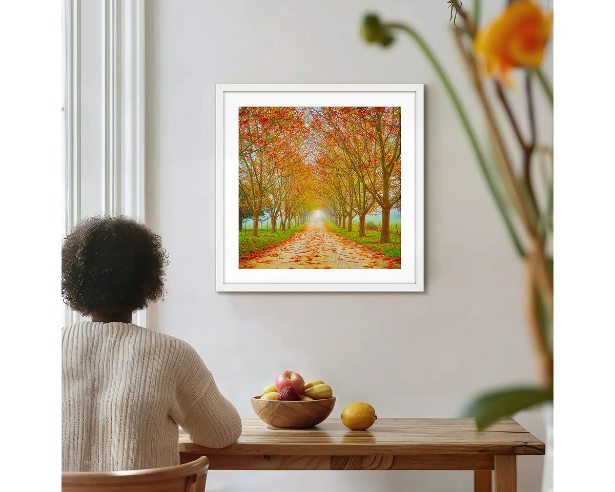 Welcome to Autumn. Photographic wall art print with a white frame, hung on a kitchen wall with a woman admiring. 