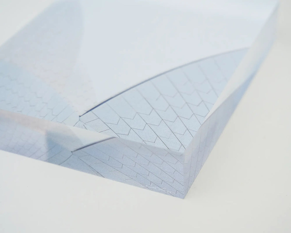 White On White. Acrylic block of Opera House shells, laying flat showing corner details.
