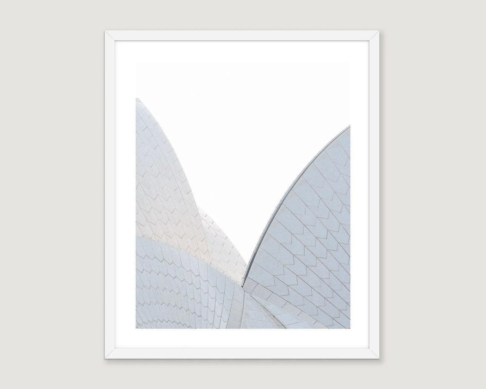 Framed artwork of an abstract architectural photograph of Sydney Opera House sails on a white background.