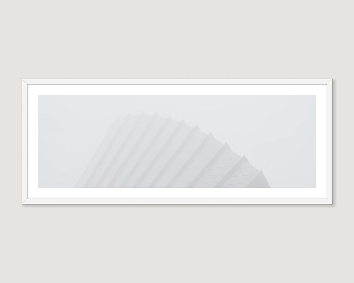 Framed abstract art piece of Whitlam Pavillion on a light grey wall.