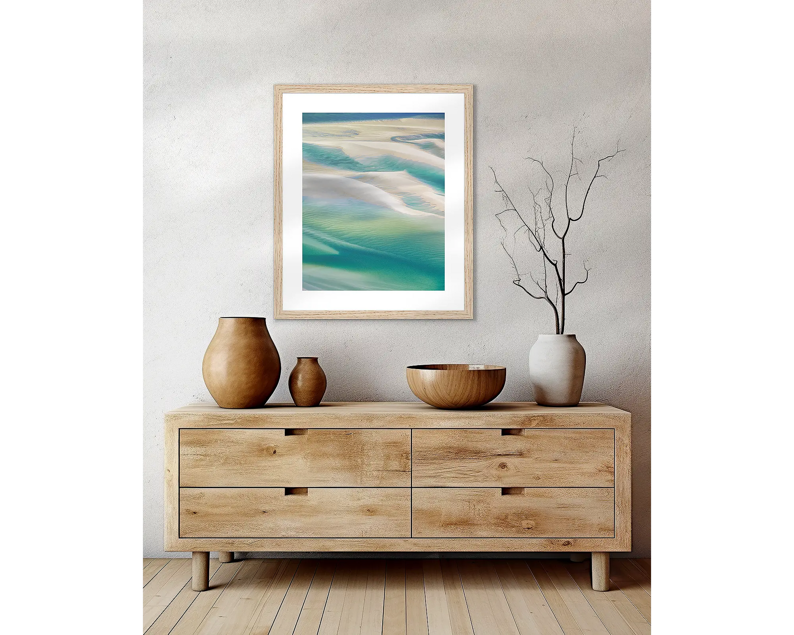 Framed artwork of abstract beach scene with blue and beige tones.