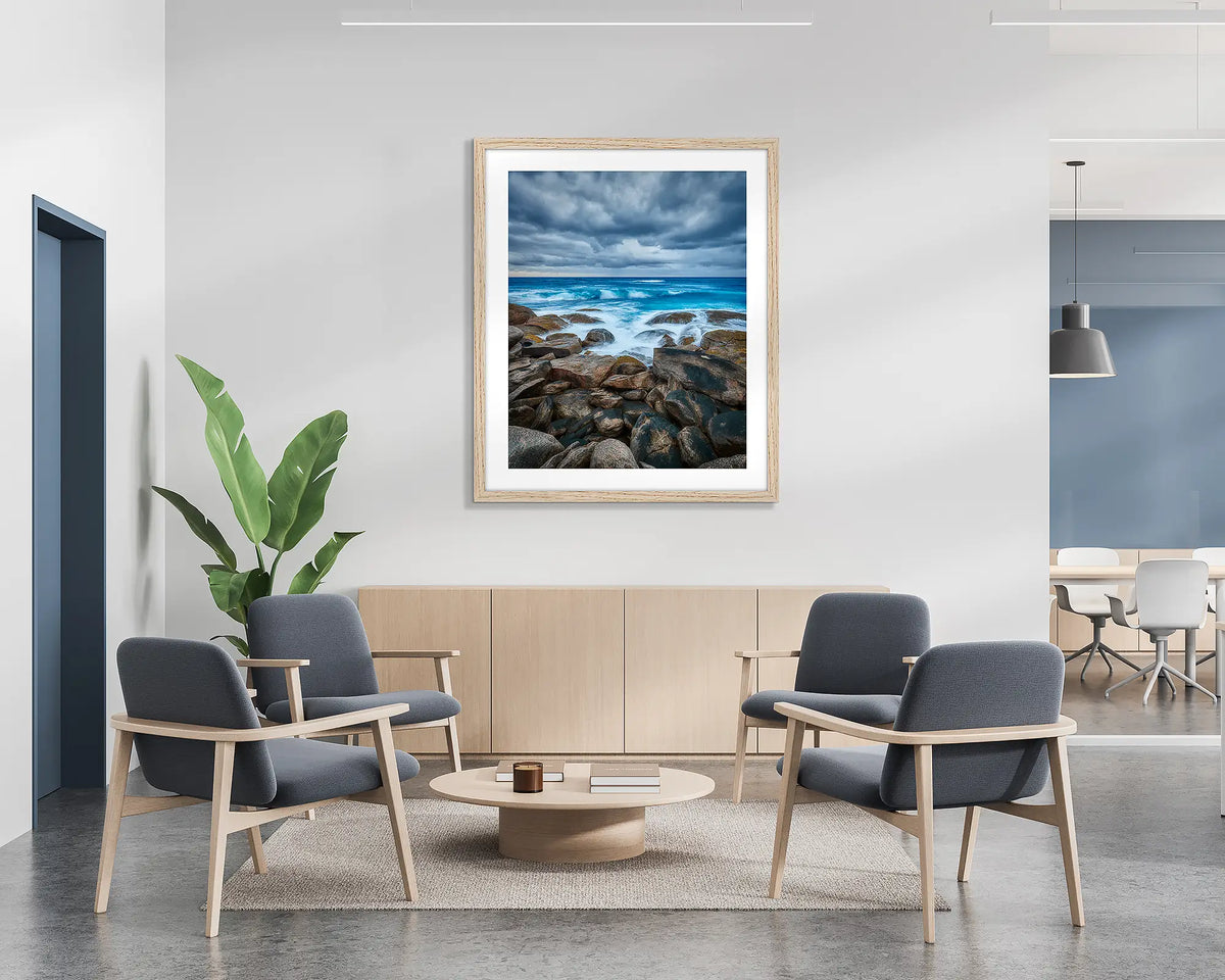 Wild West. Coastal wall art print with a timber frame hung in a reception area. 