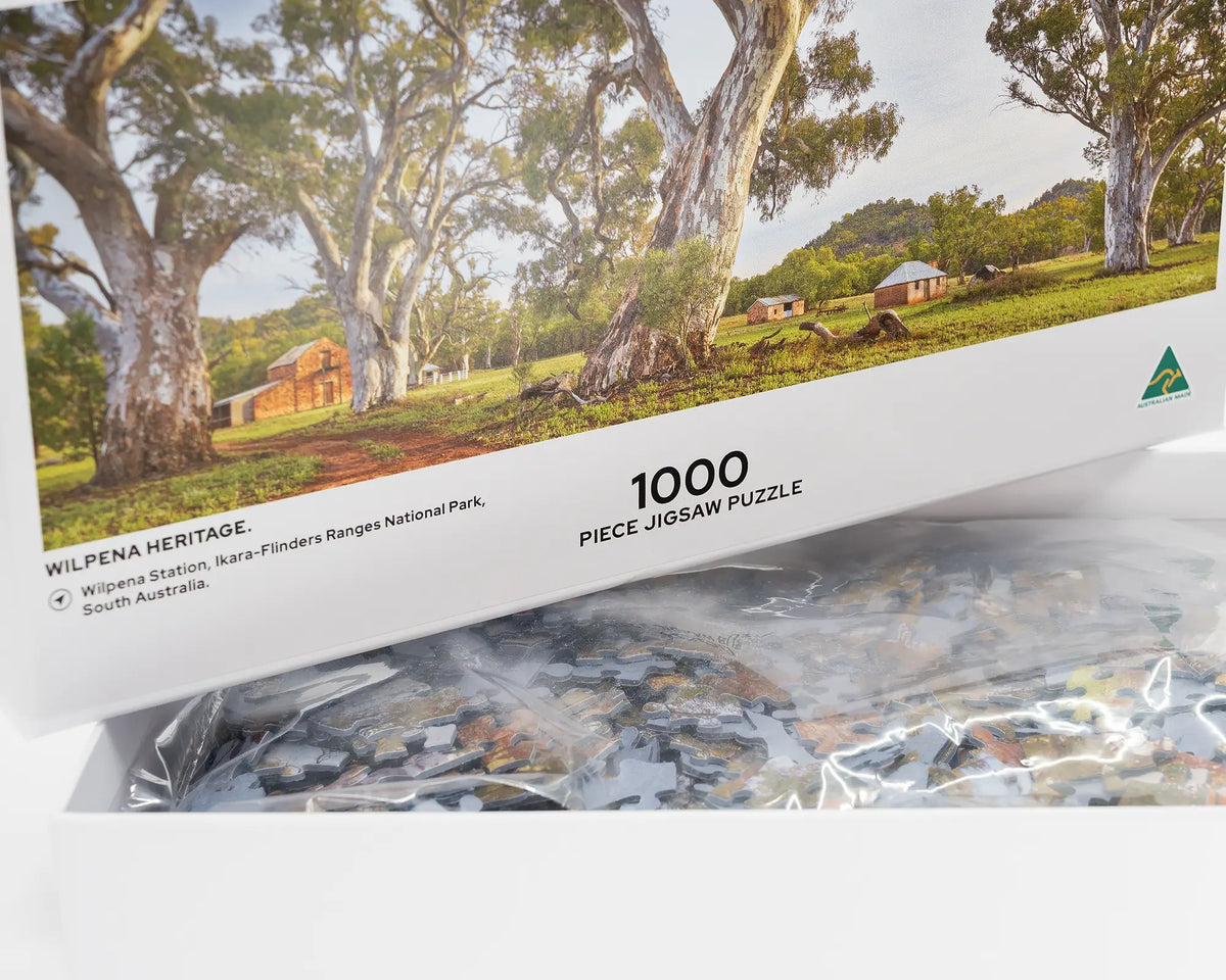 Wilpena Heritage. 1000 piece jigsaw puzzle of Wilpena Station, Ikara-Flinders Ranges National Park, open box showing puzzle pieces.