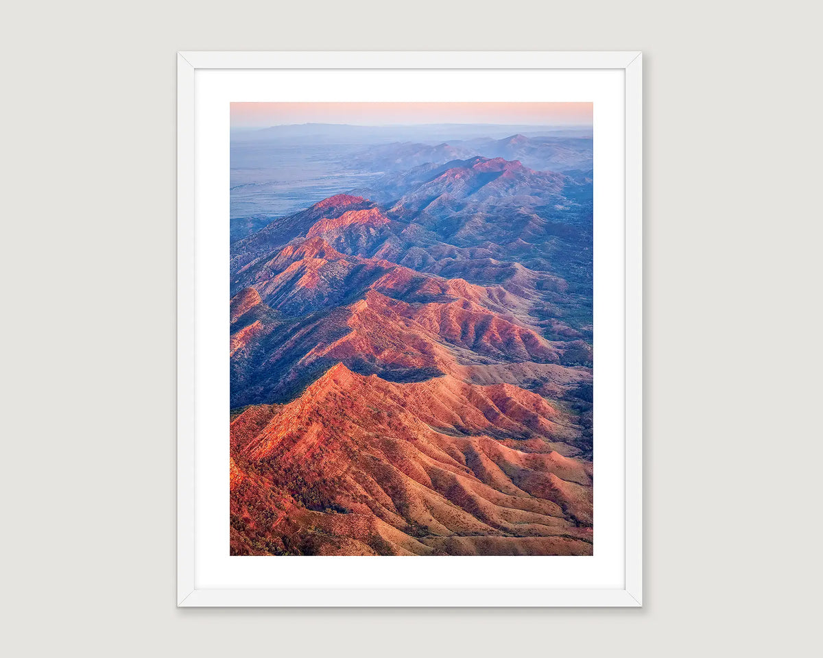 Framed artwork of Flinders Ranges sunrise with a white frame.