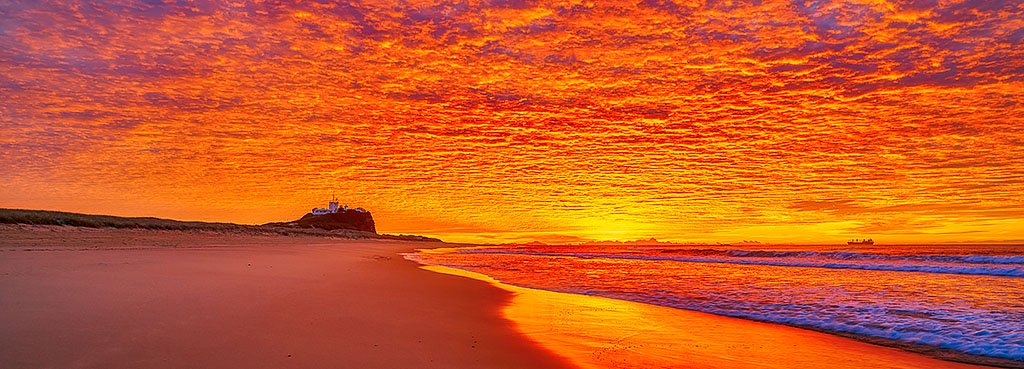 Sky Fire, sunrise at Nobbys Beach, New South Wales